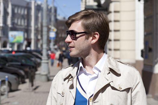 Portrait of young attractive man, outdoors