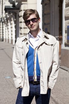 Portrait of young attractive man, outdoors