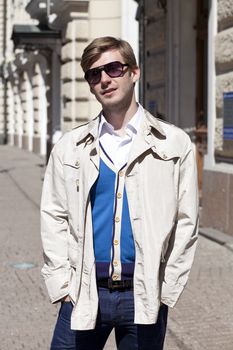 Portrait of young attractive man, outdoors