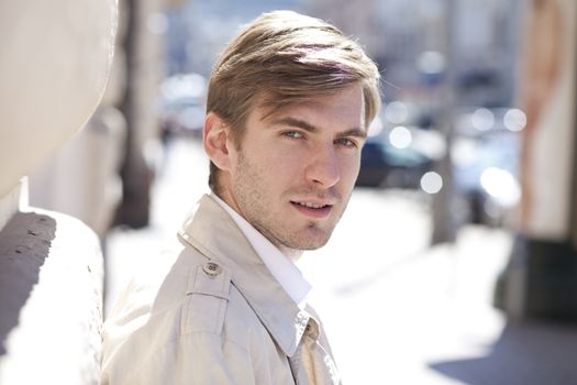 Portrait of young attractive man, outdoors