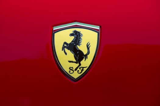 Ferrari 'Prancing Horse' symbol on the front of a Ferrari supercar.