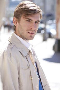 Portrait of young attractive man, outdoors