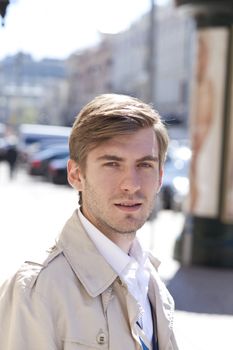 Portrait of young attractive man, outdoors