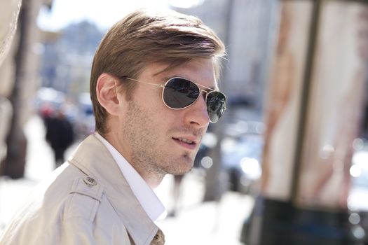 Portrait of young attractive man, outdoors