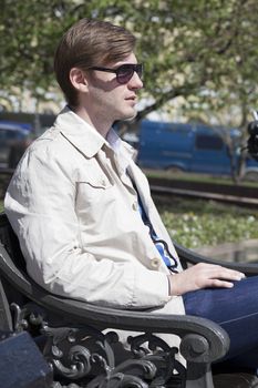 Portrait of young attractive man, outdoors