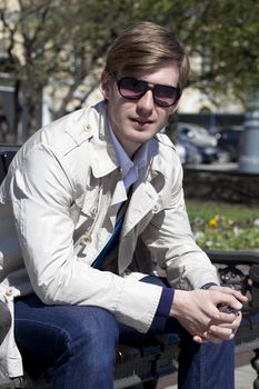 Portrait of young attractive man, outdoors