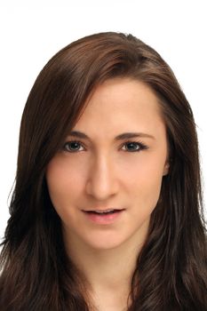 A studio close-up of a lovely young brunette.