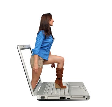 A lovely young brunette steps out of the screen onto the keyboard of a laptop computer.  Isolated on a white background with generous copyspace.