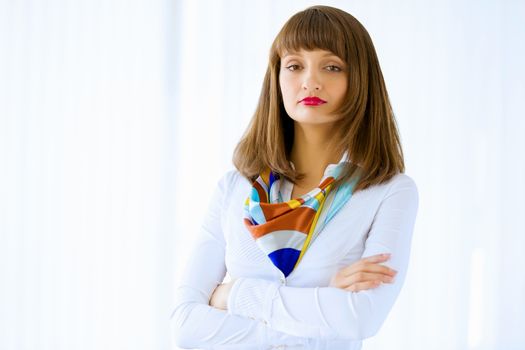 Image of attractive successful businesswoman in business suit smiling