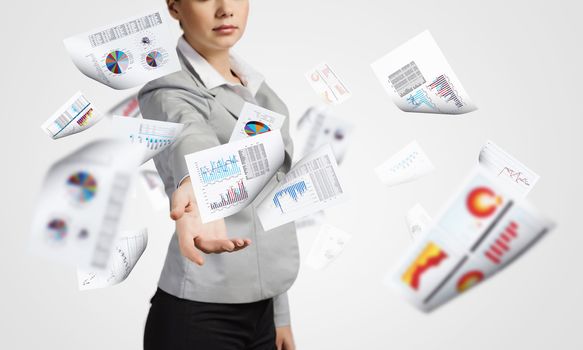 Businesswoman, secretary throwing paper documents. Office life concept