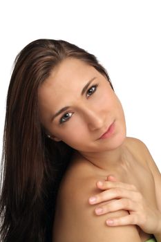 A studio close-up of a lovely young brunette.