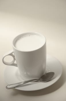 Hot milk cup on table