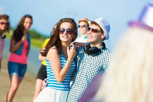 Image of young people having fun outdoors