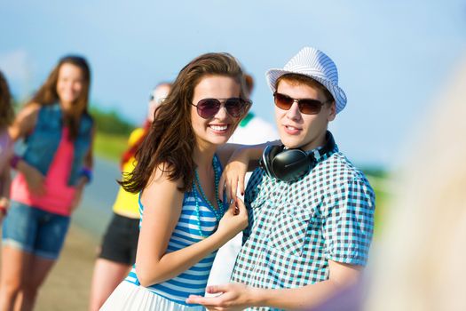 Image of young people having fun outdoors