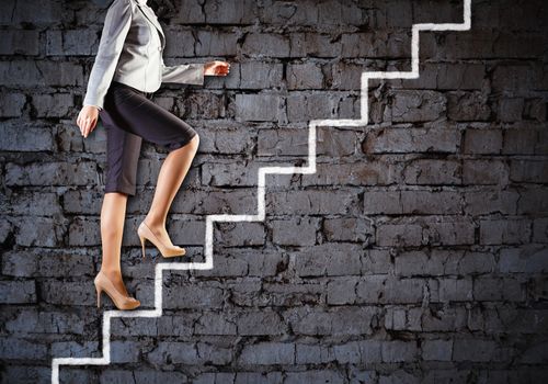 Image of businesswoman climbing career ladder. Success and achievement