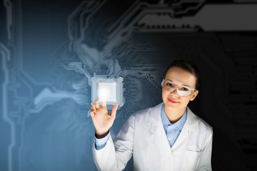 Image of young woman scientist touching icon of media screen