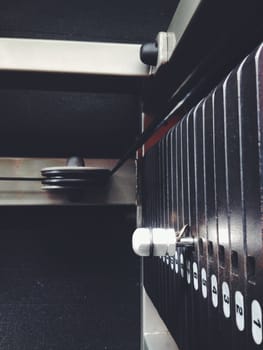 Stack of metal weights in gym