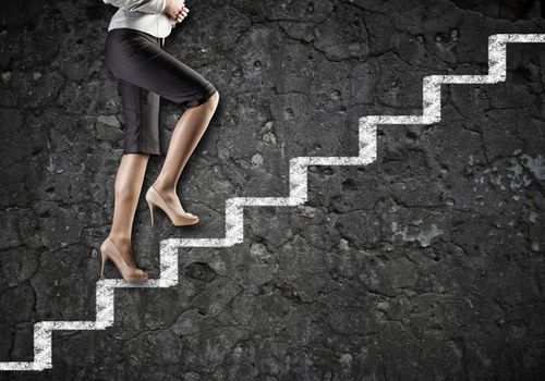 Image of businesswoman climbing career ladder. Success and achievement