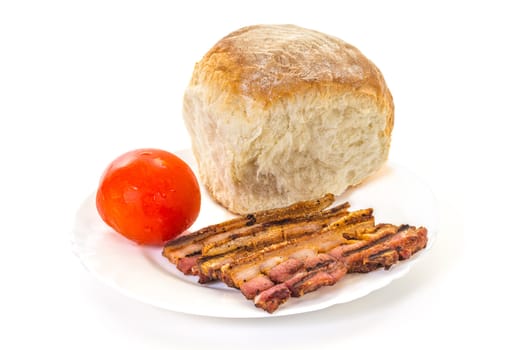 Grilled or Fried Bacon with Fresh Tomato and Bread Bun on the Plate, high key