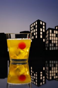 Skrew Driver cocktail in city skyline setting