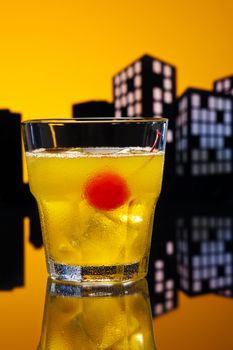 Skrew Driver cocktail in city skyline setting