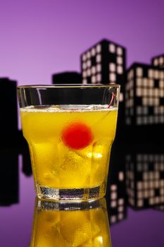 Skrew Driver cocktail in city skyline setting