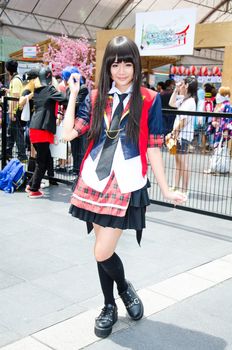 BANGKOK - SEPTEMBER 1 : Unidentified Japanese anime cosplay pose in Japan Festa in Bangkok 2013 on September 1, 2013 at Central Word, Bangkok, Thailand.