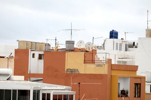 Antennas on a Roof over a Cloudy Sky, in Canary Islands, Spain