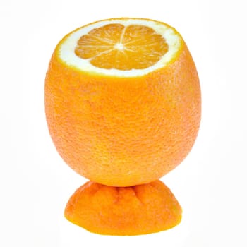 A sliced orange standing on her top