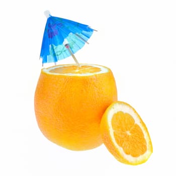 A sliced orange with a cocktail umbrella.