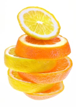 Lemon and orange slices alternately stacked