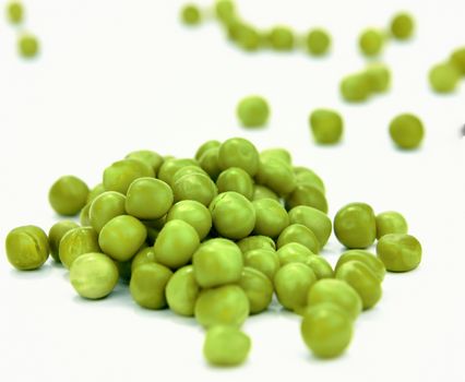 isolated cooked peas over white background