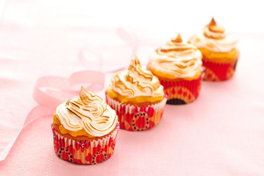 Cupcakes with whipped cream and icing