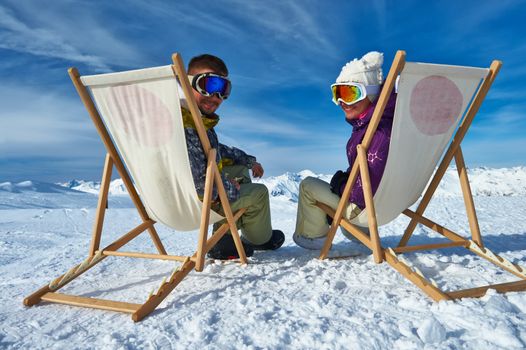 Couple at mountains in winter, Meribel, Alps, France