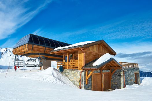 Ski lift station in mountains at winter, Meribel, Alps, France