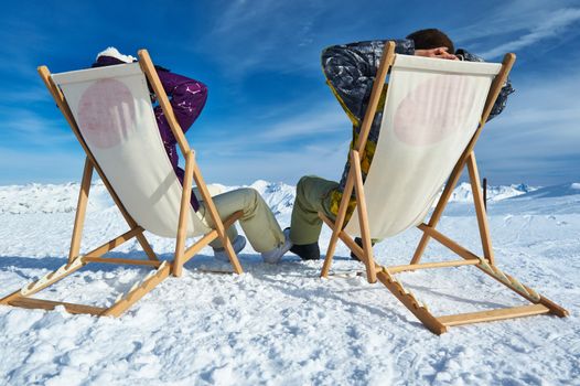 Couple at mountains in winter, Meribel, Alps, France