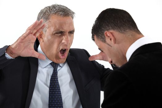 Boss shouting at useless employee