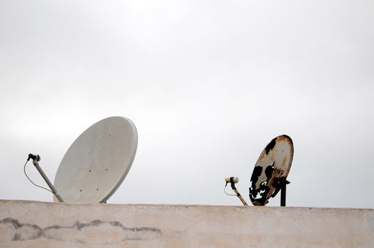 Antennas on a Roof over a Cloudy Sky, in Canary Islands, Spain