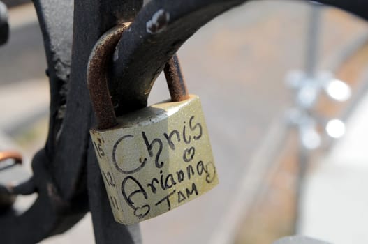 A Colored Metal Lover's Lock on a Bridge