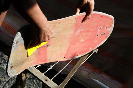 Restore an Old Skateboard with a Yellow Sandpaper