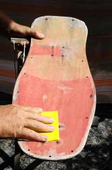 Restore an Old Skateboard with a Yellow Sandpaper