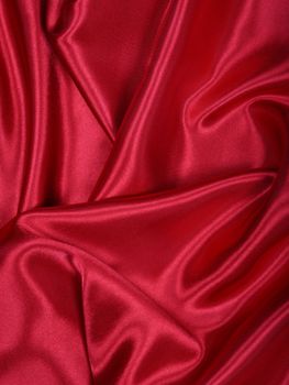 Smooth elegant red silk can use as background 