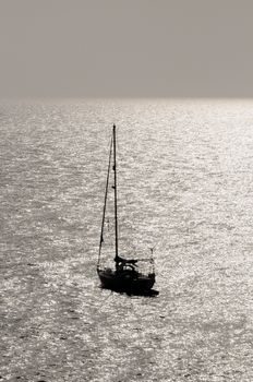 Silhouetted Sailing Boat on the Atlantic Ocean Near Canary Island