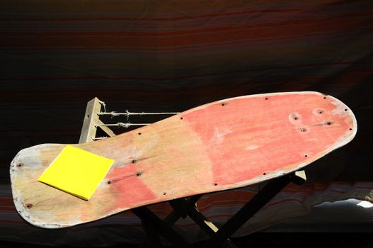 Restore an Old Skateboard with a Yellow Sandpaper