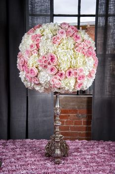 Image of a floral arrangement to be used at a wedding