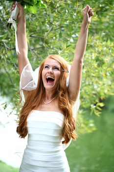 Portrait of beautiful bride with flowers