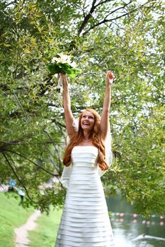 Portrait of beautiful bride with flowers