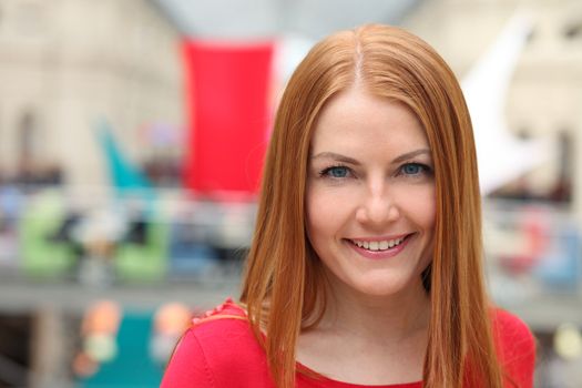 Young beautiful red hair woman