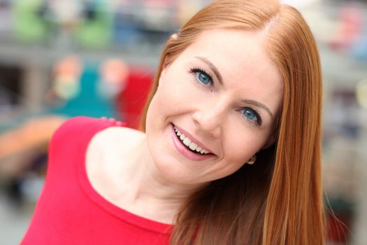 Young beautiful red hair woman