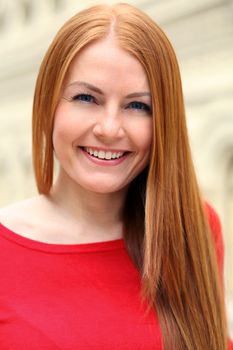 Young beautiful red hair woman